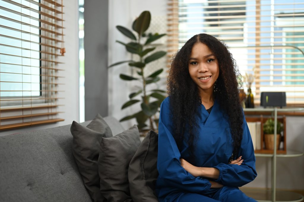 Confident African dementia care nurse with stethoscope at home from ODA's team in Hamilton, Ontario
