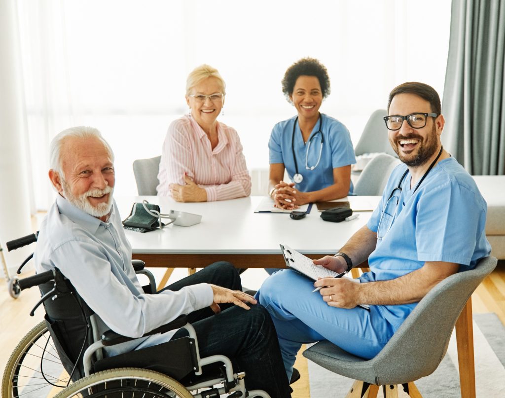 nurse doctor senior care caregiver help assistence wheelchair retirement home nursing elderly woman